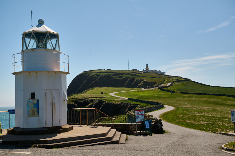 Walking around Sumburgh Head and the lighthouse in Shetland, Scotland.