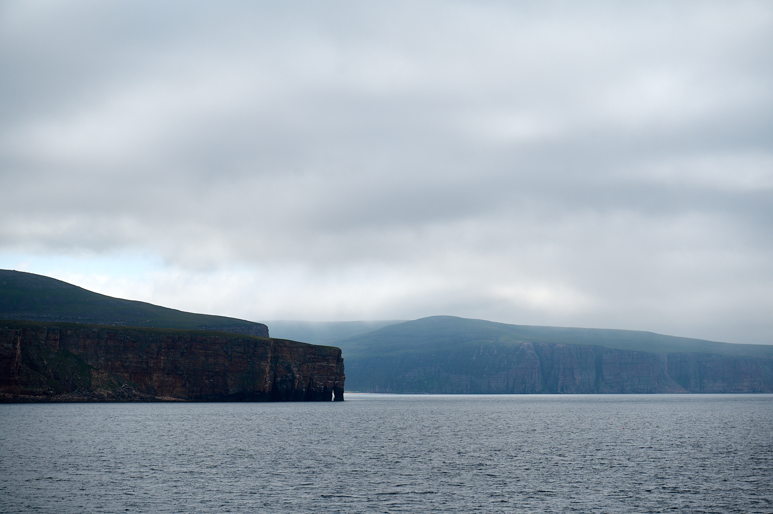 Leaving Orkney and sailing next to the Old Man of Hoy.